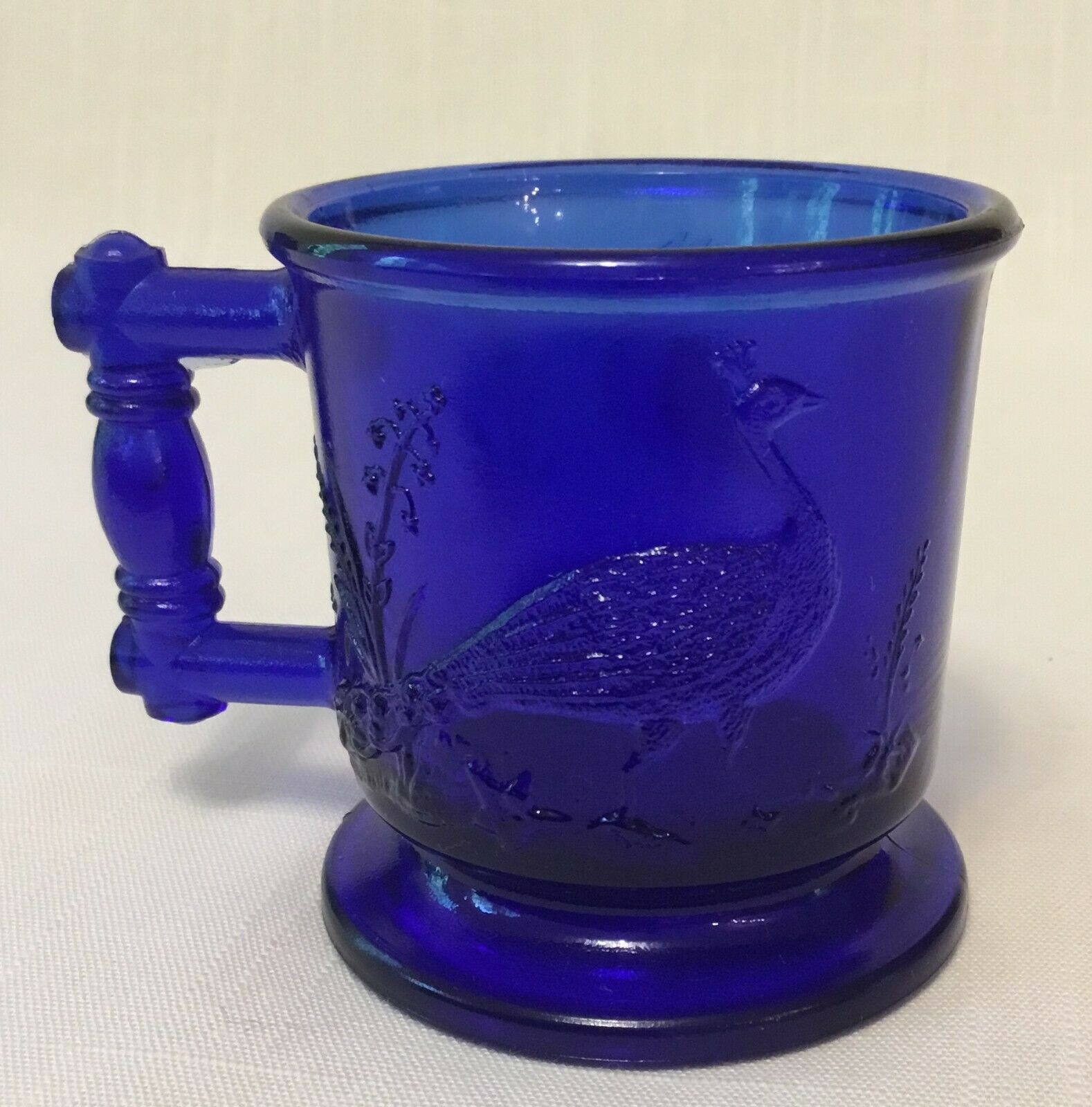 Cobalt Blue Childs Mug With Peacock And Stork Degenhart